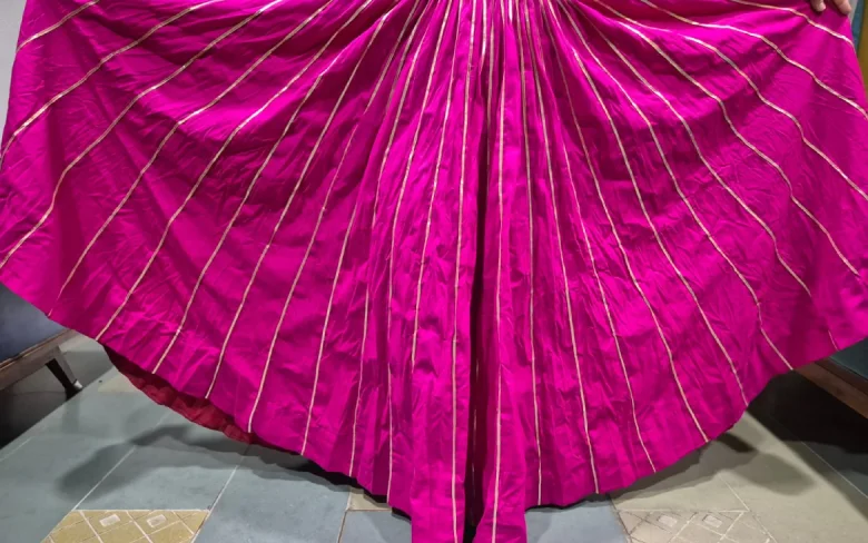 Close-up of Zari thread work on silk